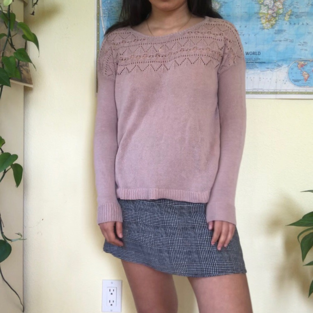 Sweater with knit detailing